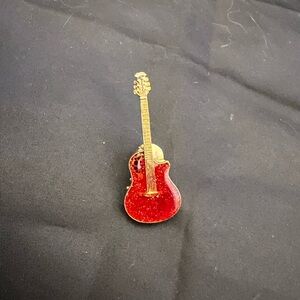 Red and gold tone guitar hat pin or jacket